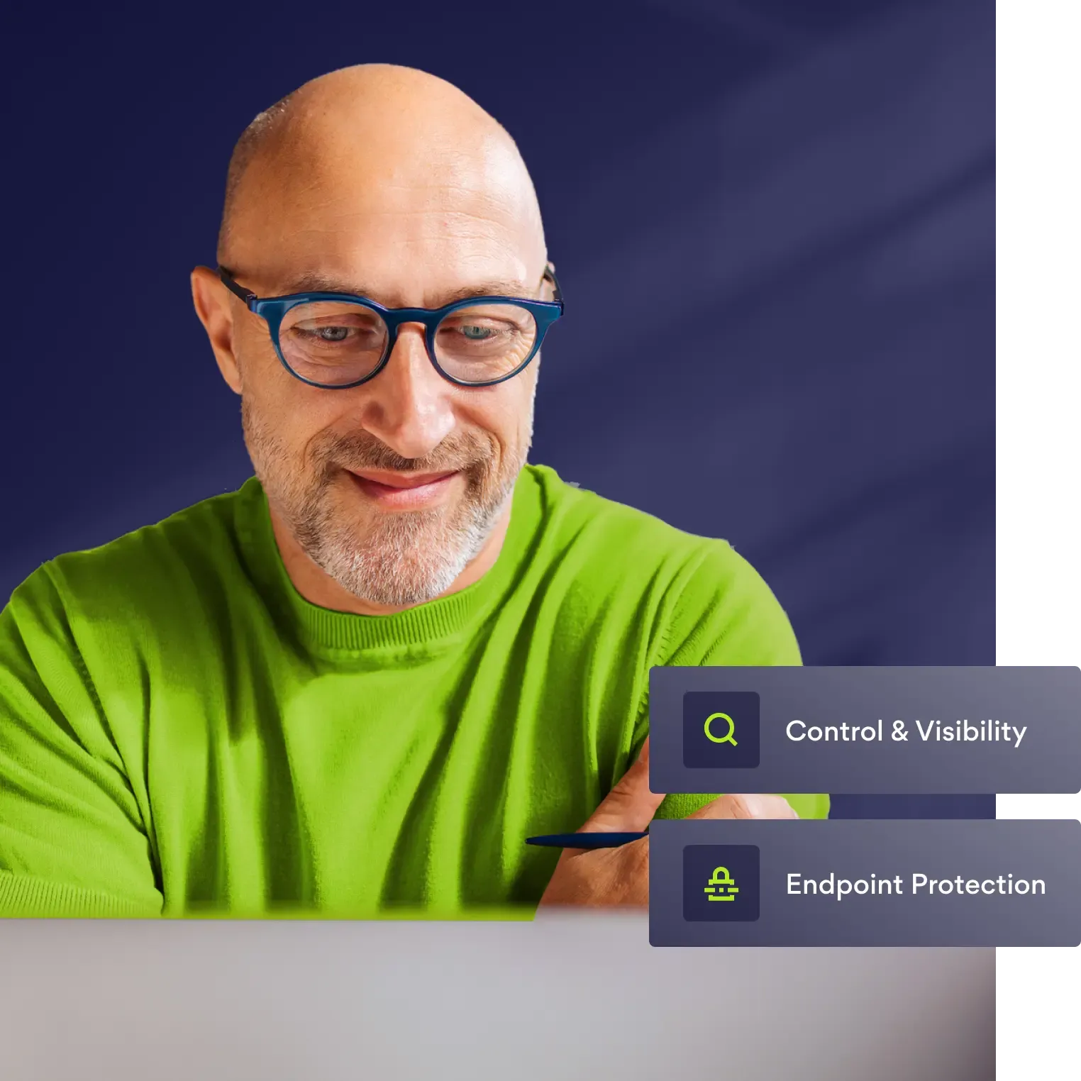 Man viewing laptop with security feature badges.