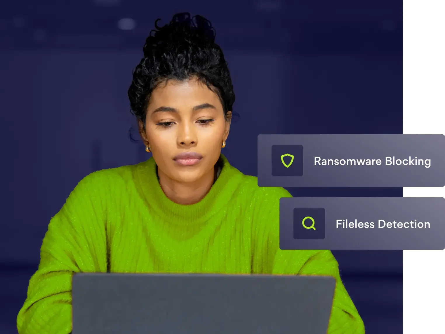 Woman on laptop with Ransomware Blocking and Fileless Detection tags.