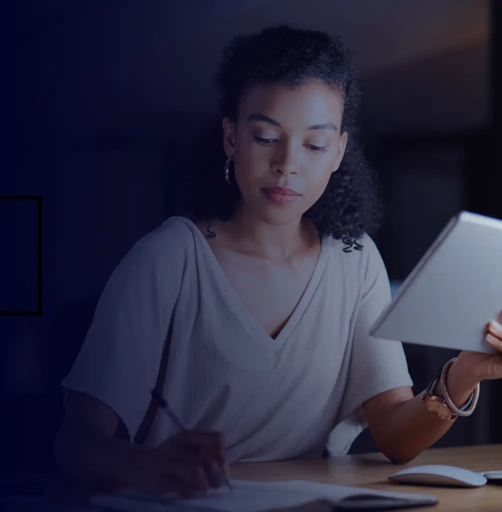 Woman taking notes about SSE and ZTNA solutions